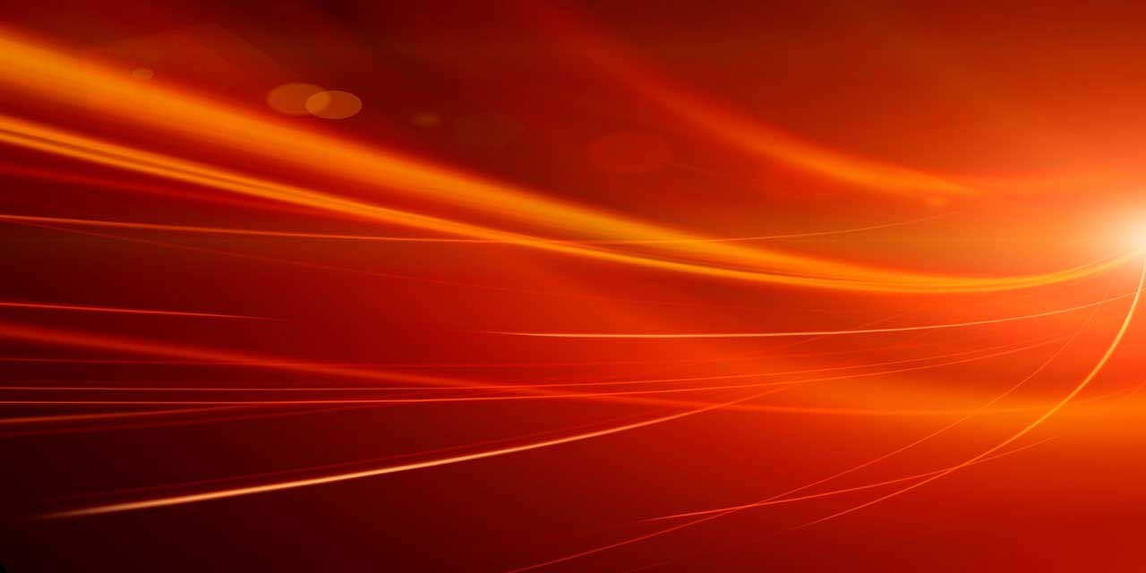 Abstract streaks of orange on an orange background.