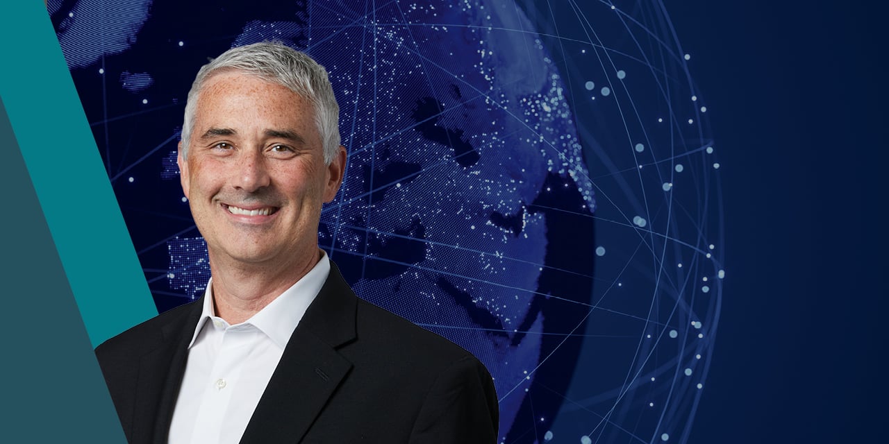 Headshot of Michael Antonelli with an abstract image of the earth in the background.