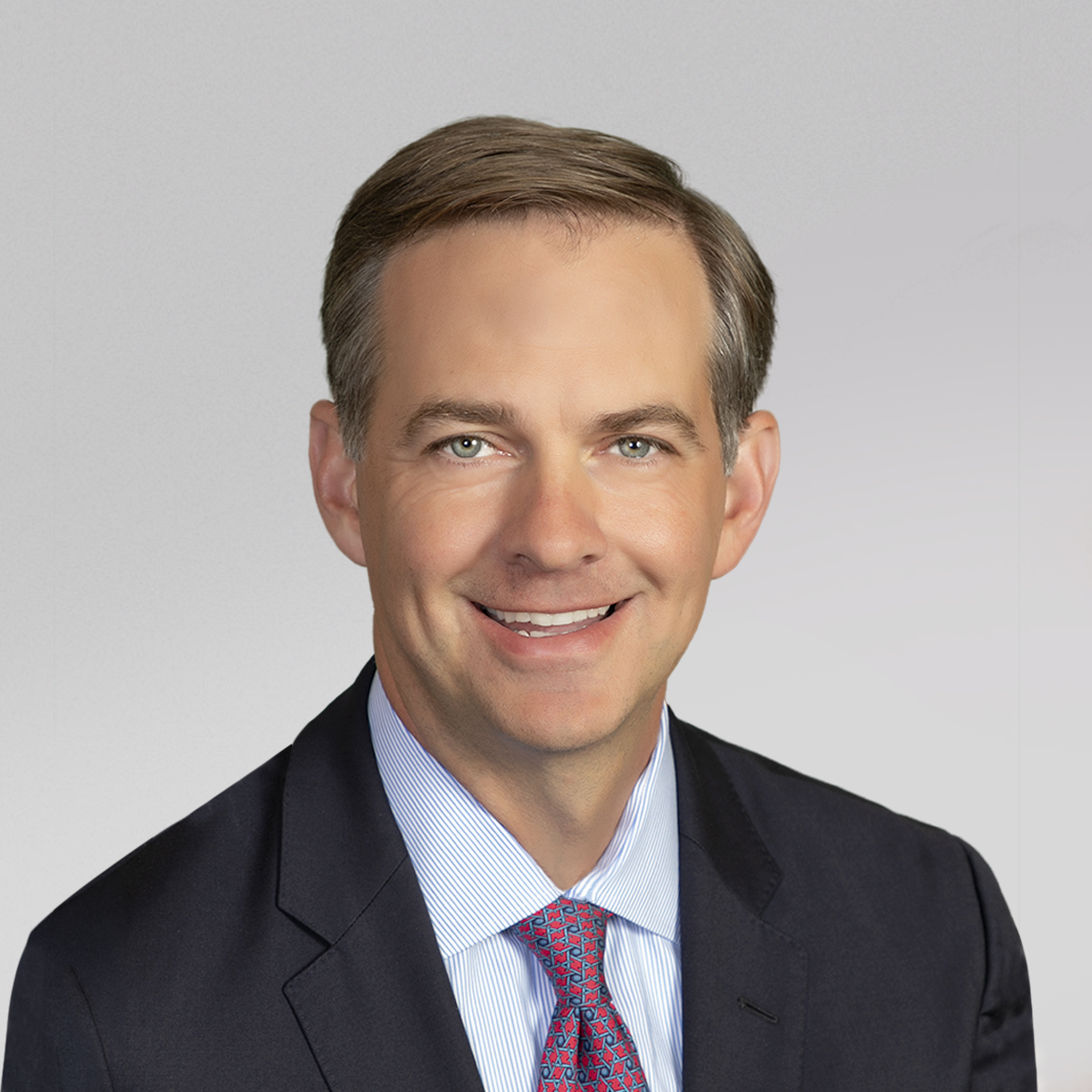 David Tarantino headshot on grey background