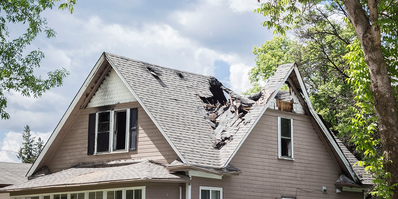 House with damaged roof
