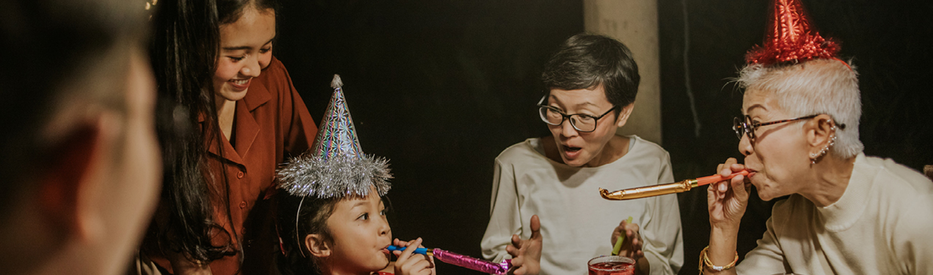 Multigenerational family celebrating a birthday.