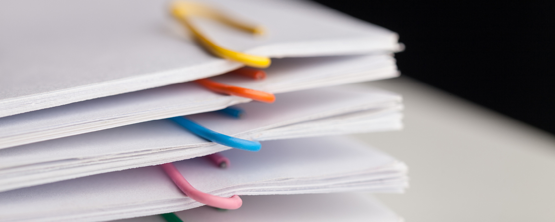 Stacks of paper clipped files