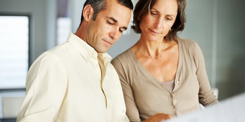 Couple looking at documents