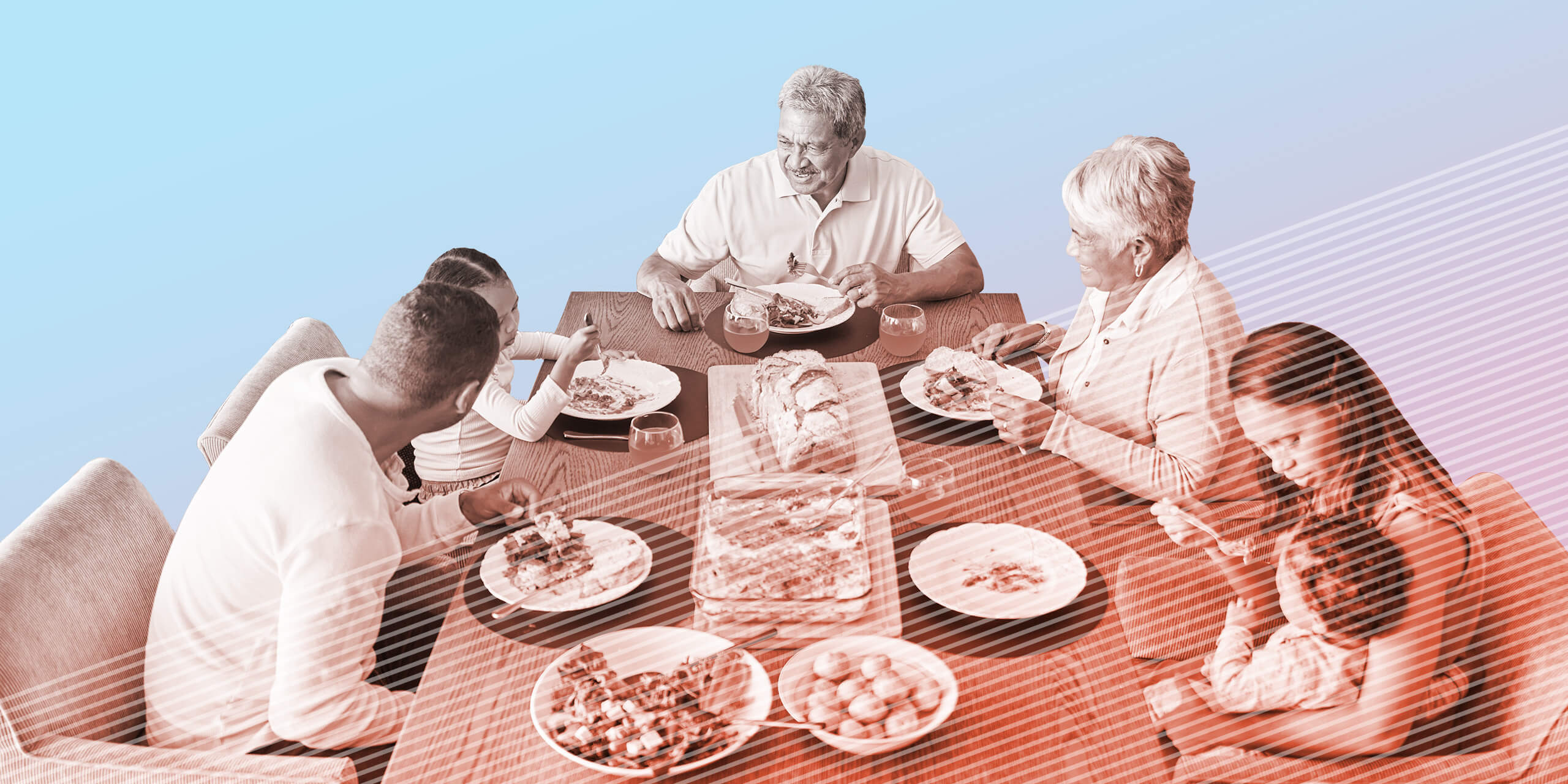 Multigenerational family eating dinner and talking