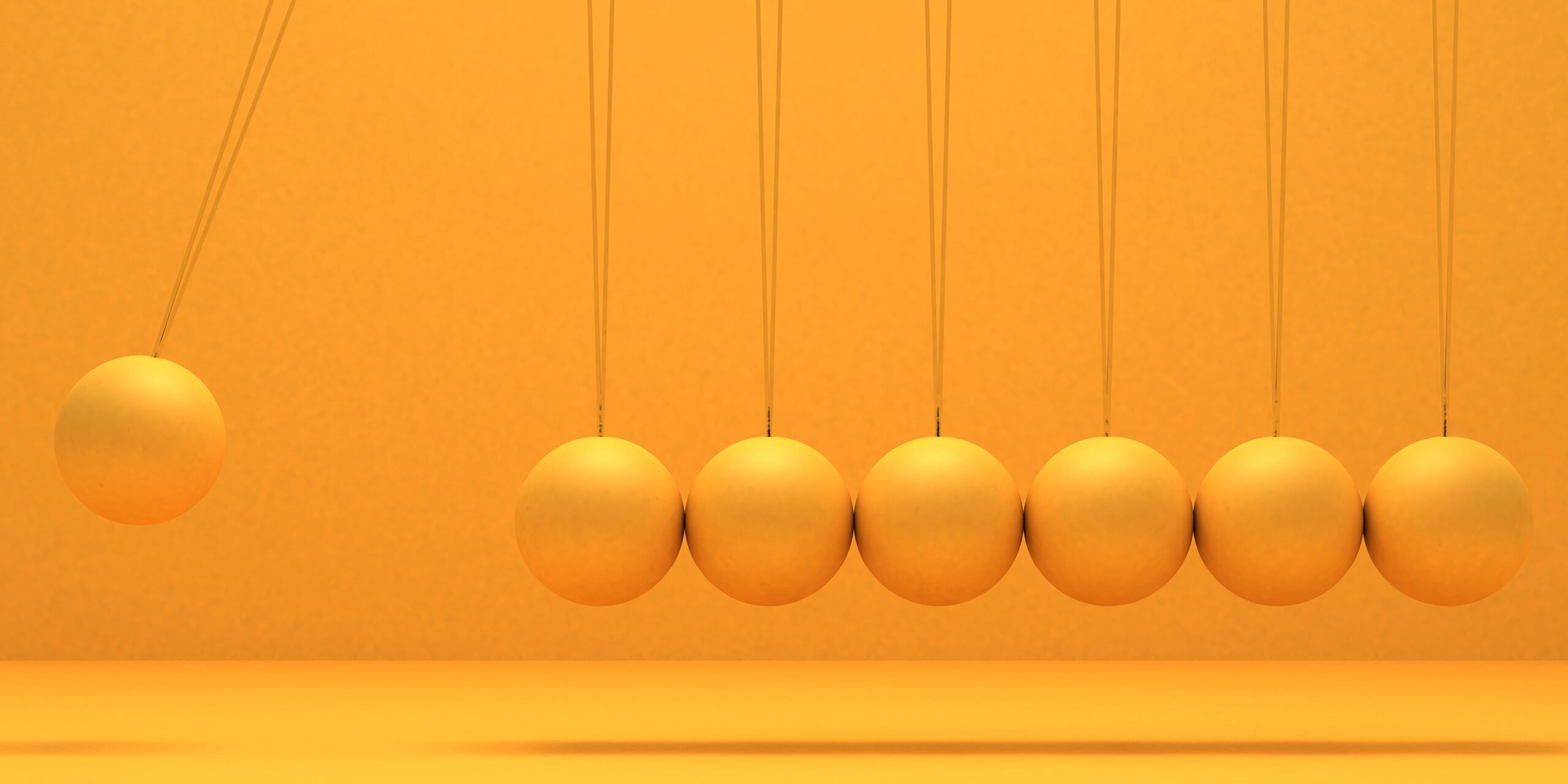 Yellow Newton's cradle
