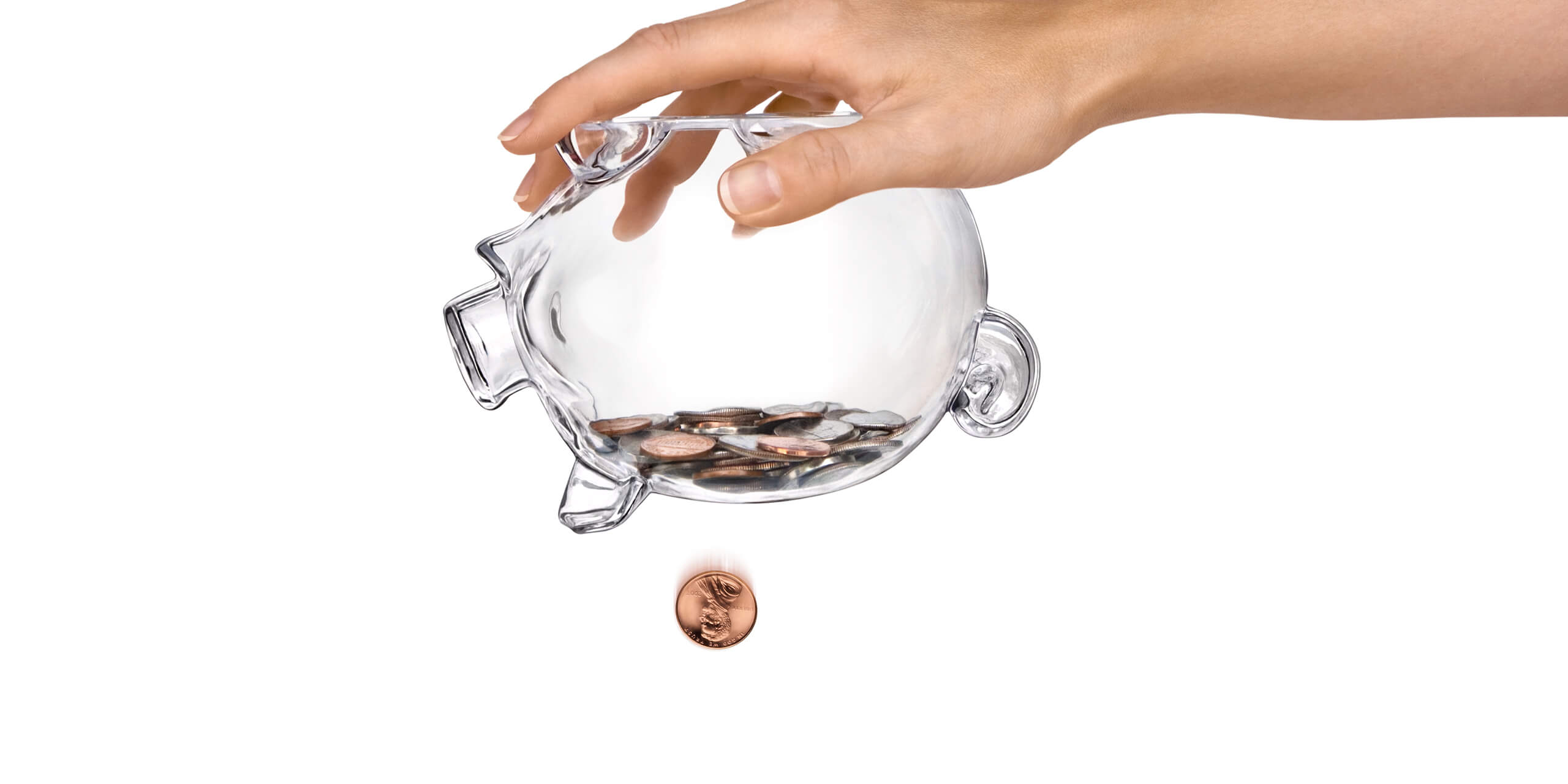 Female Hands Holding Clear Piggy Bank Shaking Out Coins