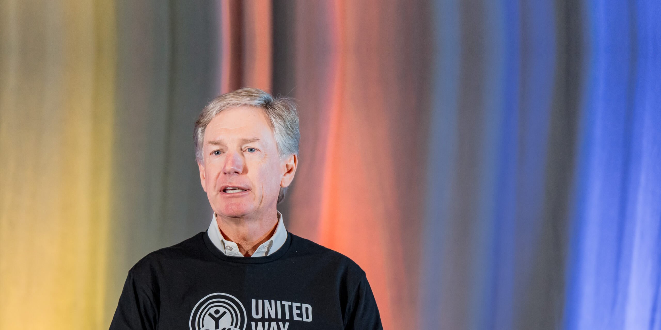 Steve Booth presenting at a United Way event
