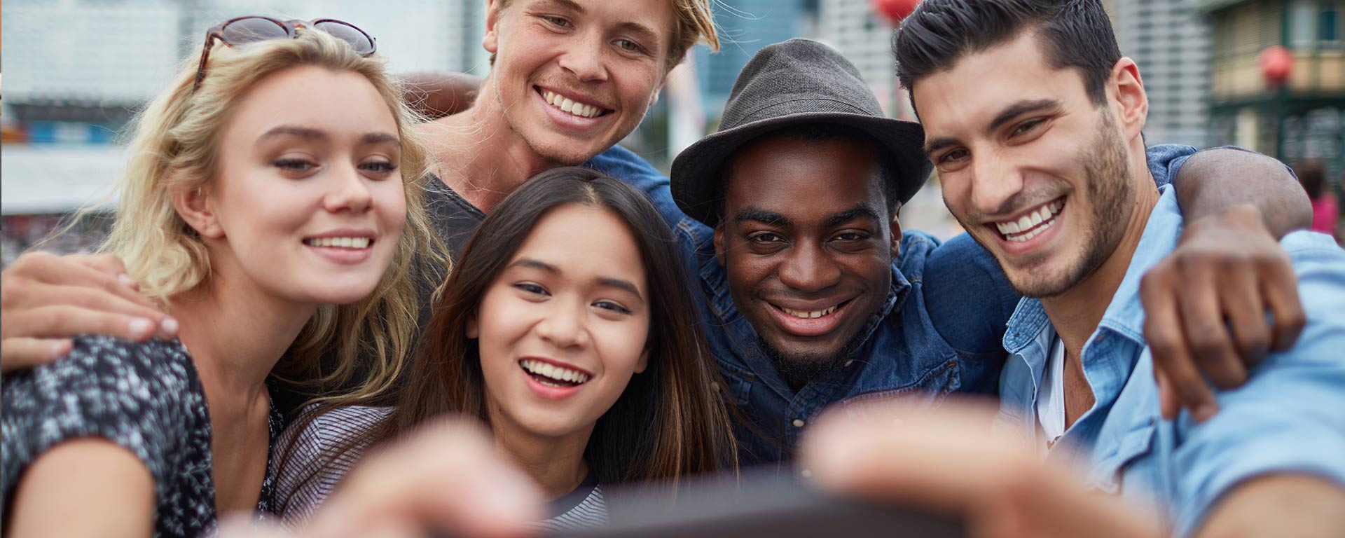Millennials taking a selfie 